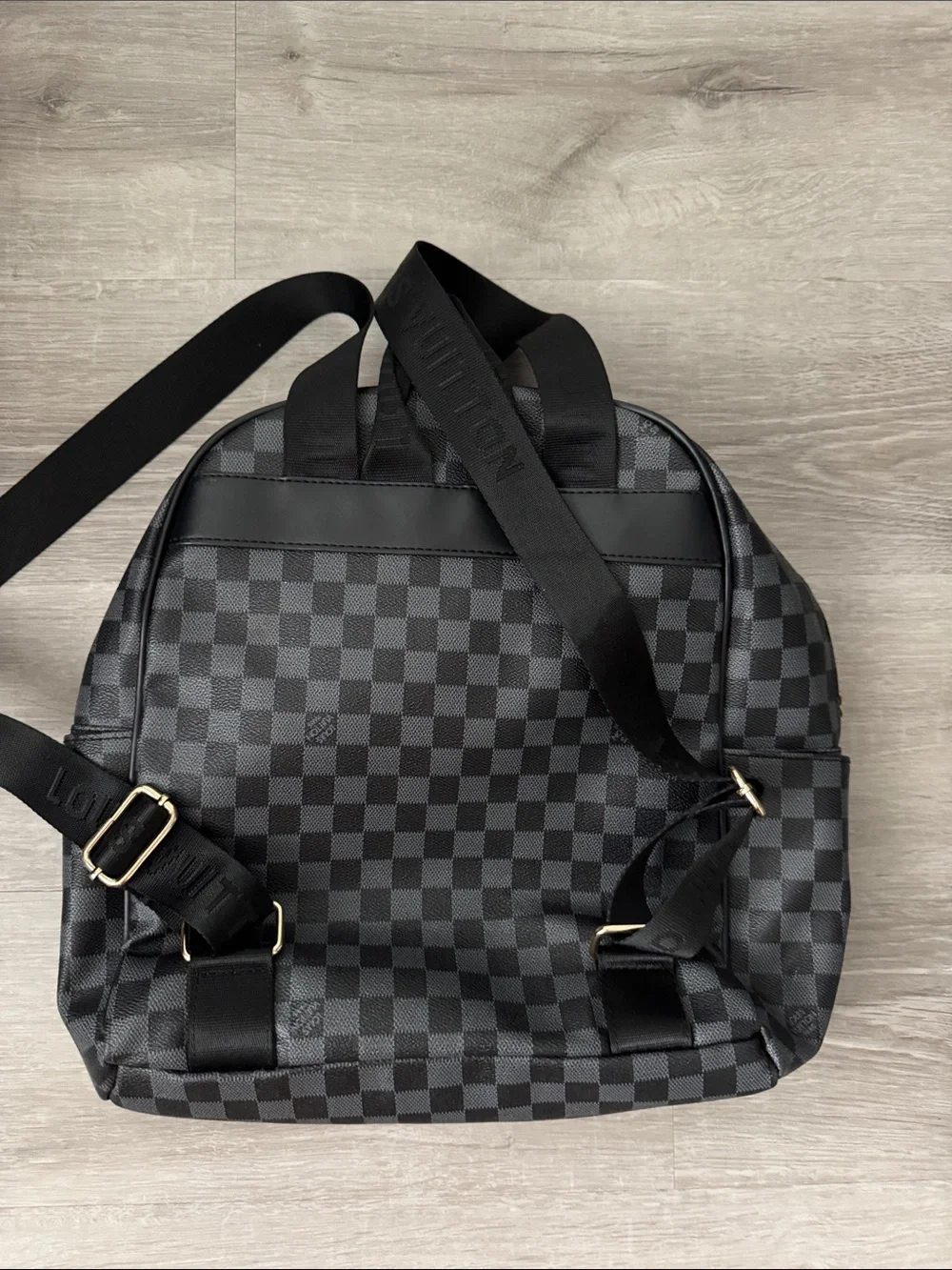 Black Checkered Men's Backpack with Gold Plate
